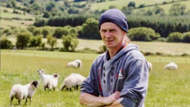 farmer tending their flock